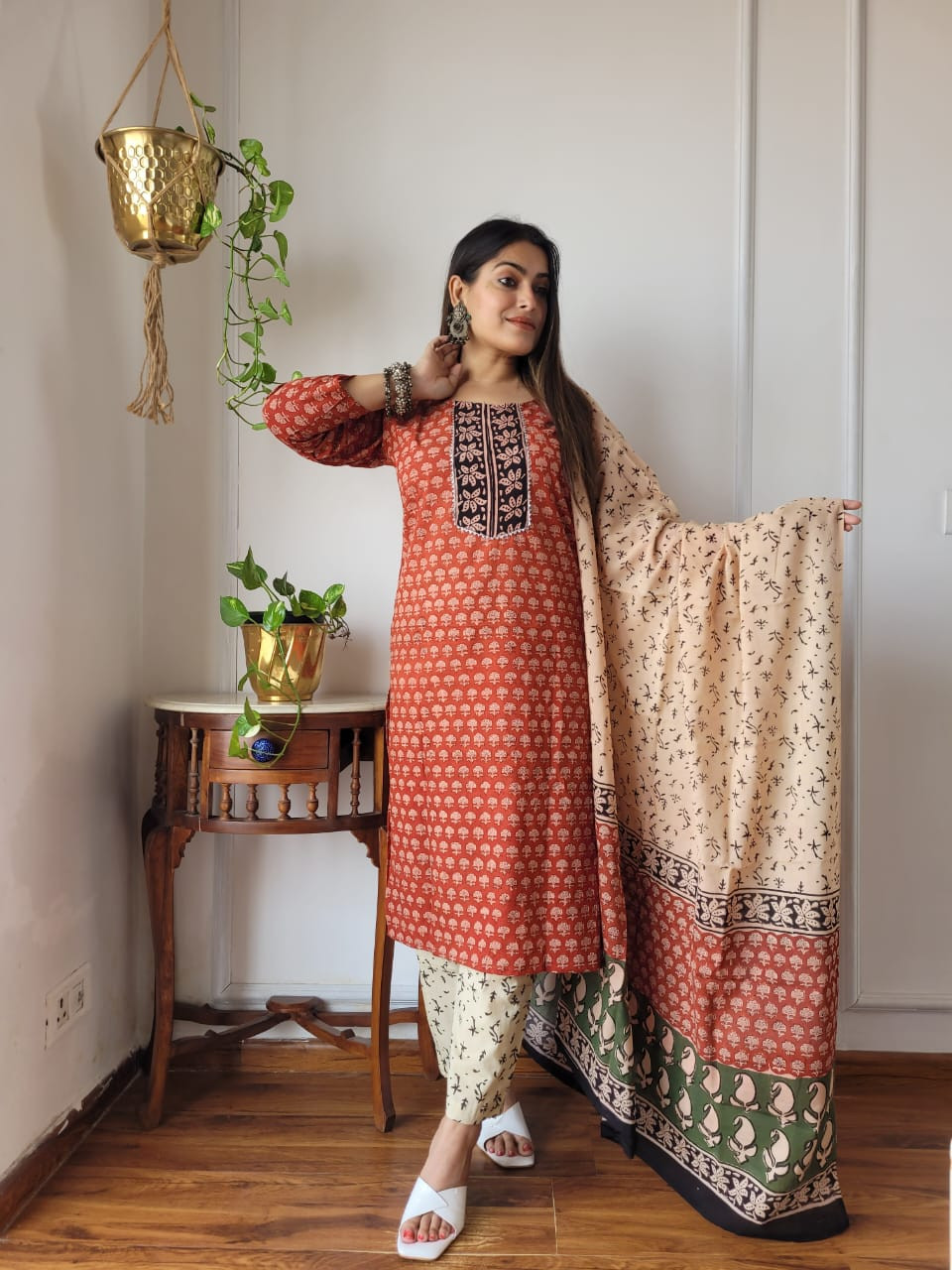 rust red and beige colors  a hand block printed cotton suit set (kurta, pants, and dupatta)