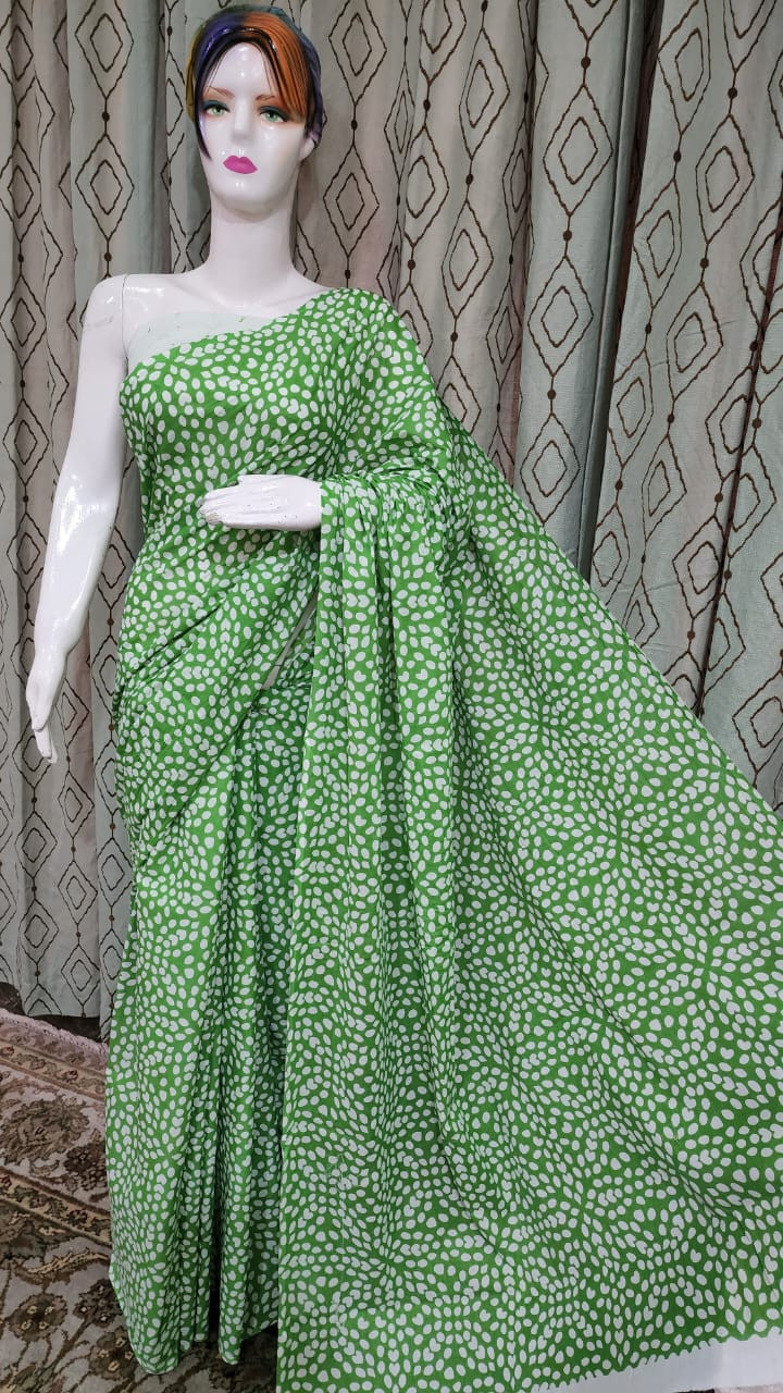 Green and White Bandhani Print Saree with an all-over heart-shaped leaf pattern.