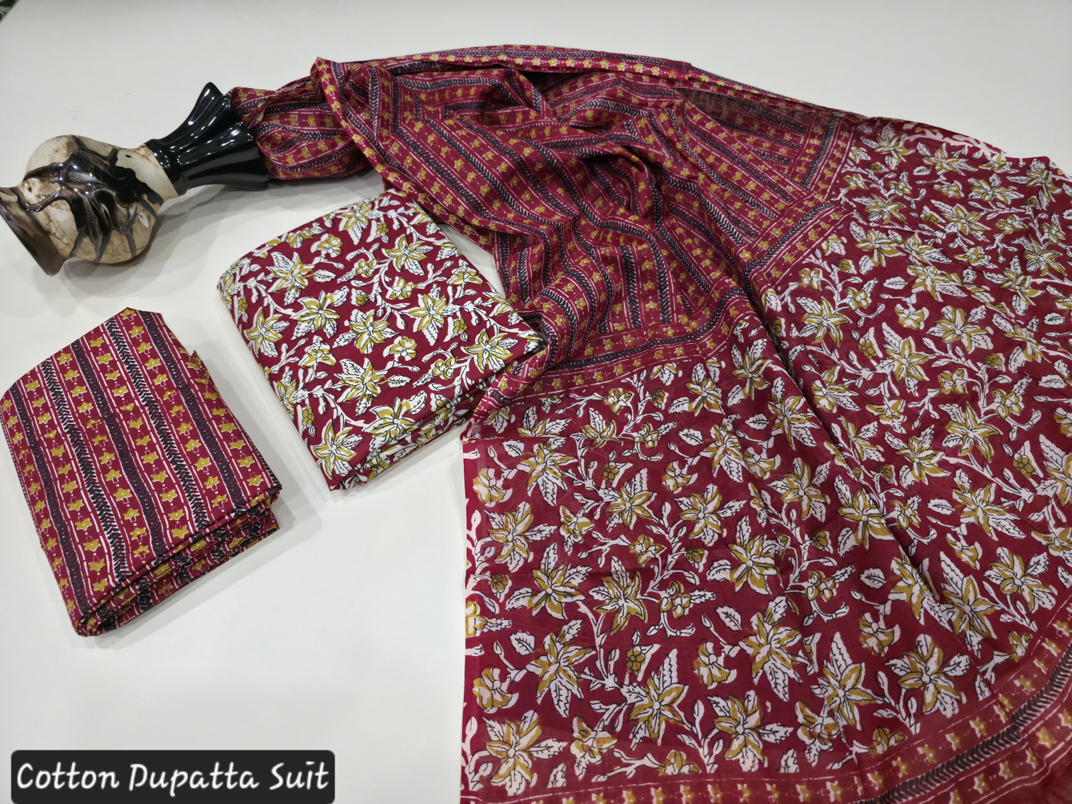 Maroon and golden Floral Hand Block Print or Ajrakh Print.