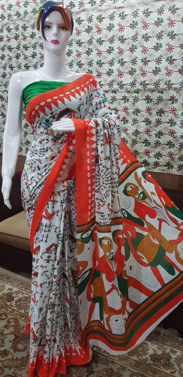 Vibrant White Cotton Saree with Traditional Orange Tribal Art and Warli Figures.
