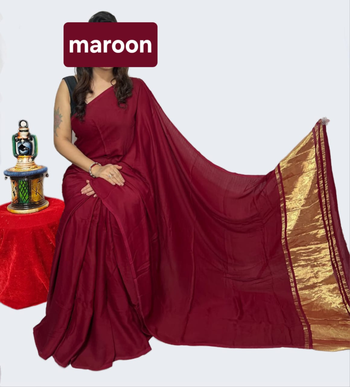 Maroon Solid Art Silk Saree with Elegant Golden Zari Border.