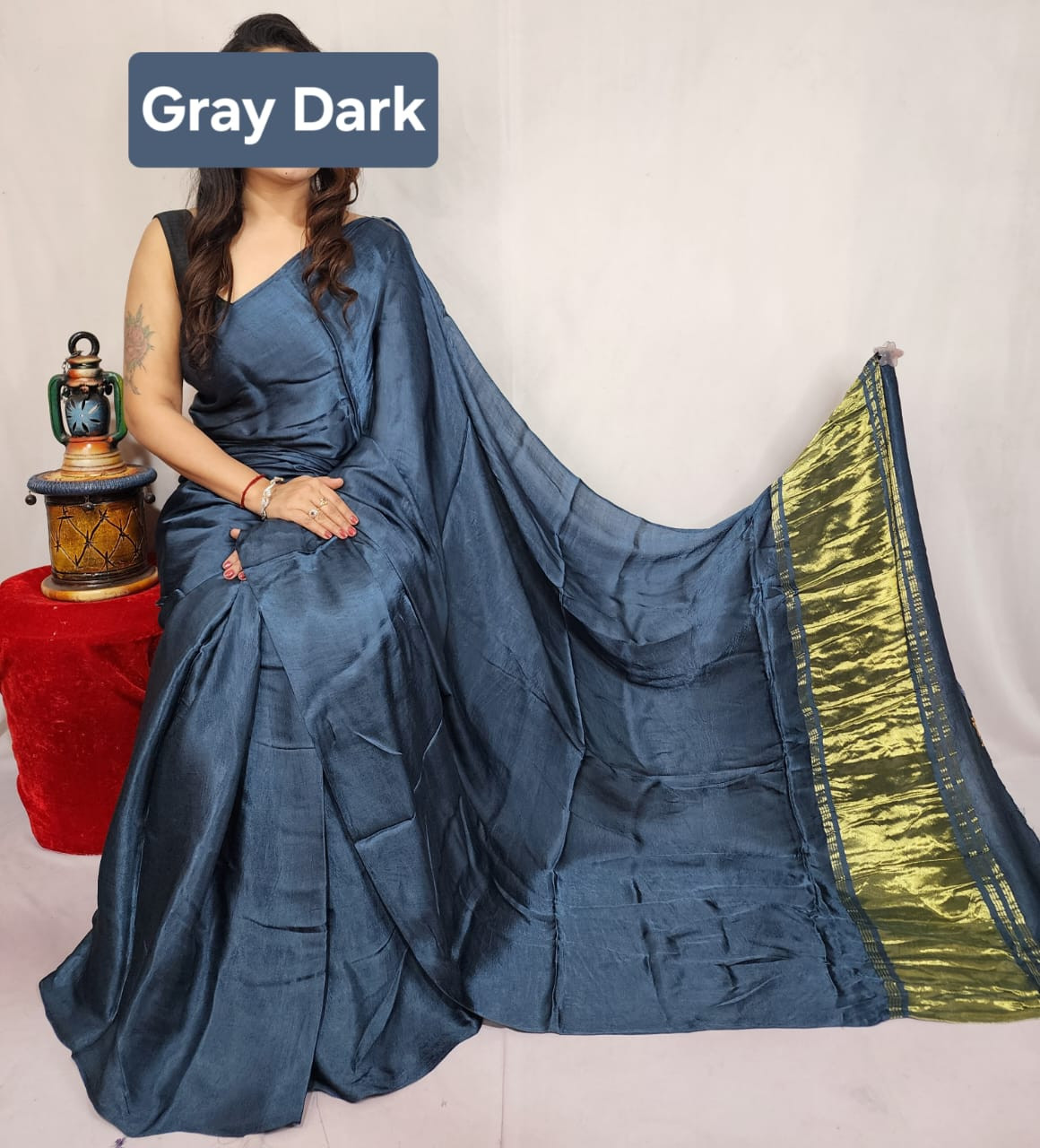 Dark Grey Modal Silk Plain Dyed Saree with an Elegant Gold Zari Border.