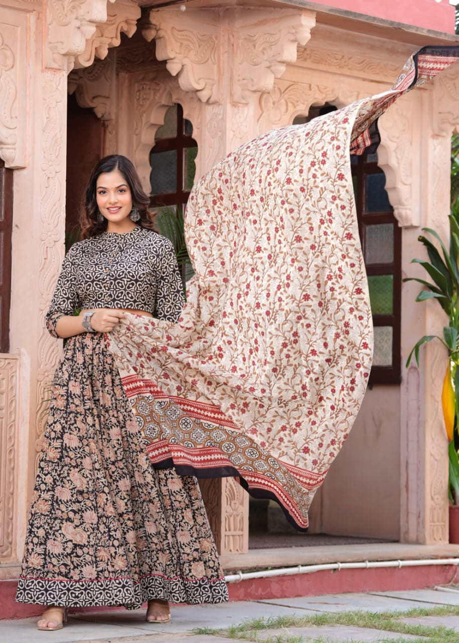 Black and Cream Traditional Kalamkari Style Floral Printed Cotton Lehenga Choli with a matching Floral Dupatta.