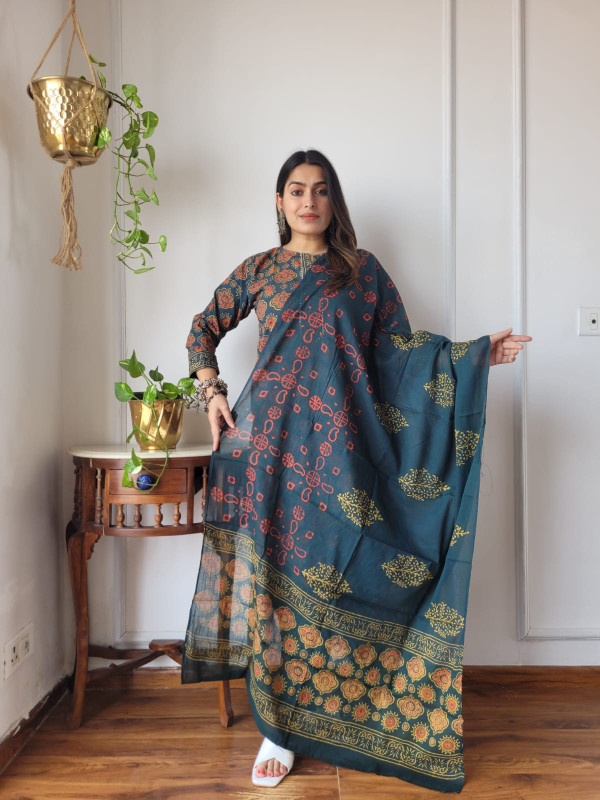 teal blue (or deep green) and orange hand block printed cotton kurta, pants, and dupatta suit set.
