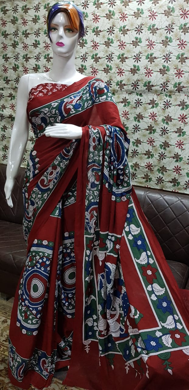 Terracotta Red Cotton Saree with Traditional Kalamkari Floral and Bird Motifs.
