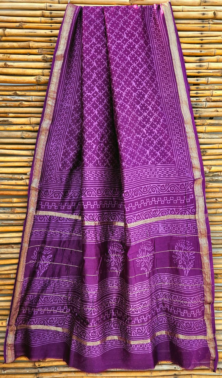 purple hand-block printed Maheshwari silk/cotton blend saree with traditional motifs and a golden zari border