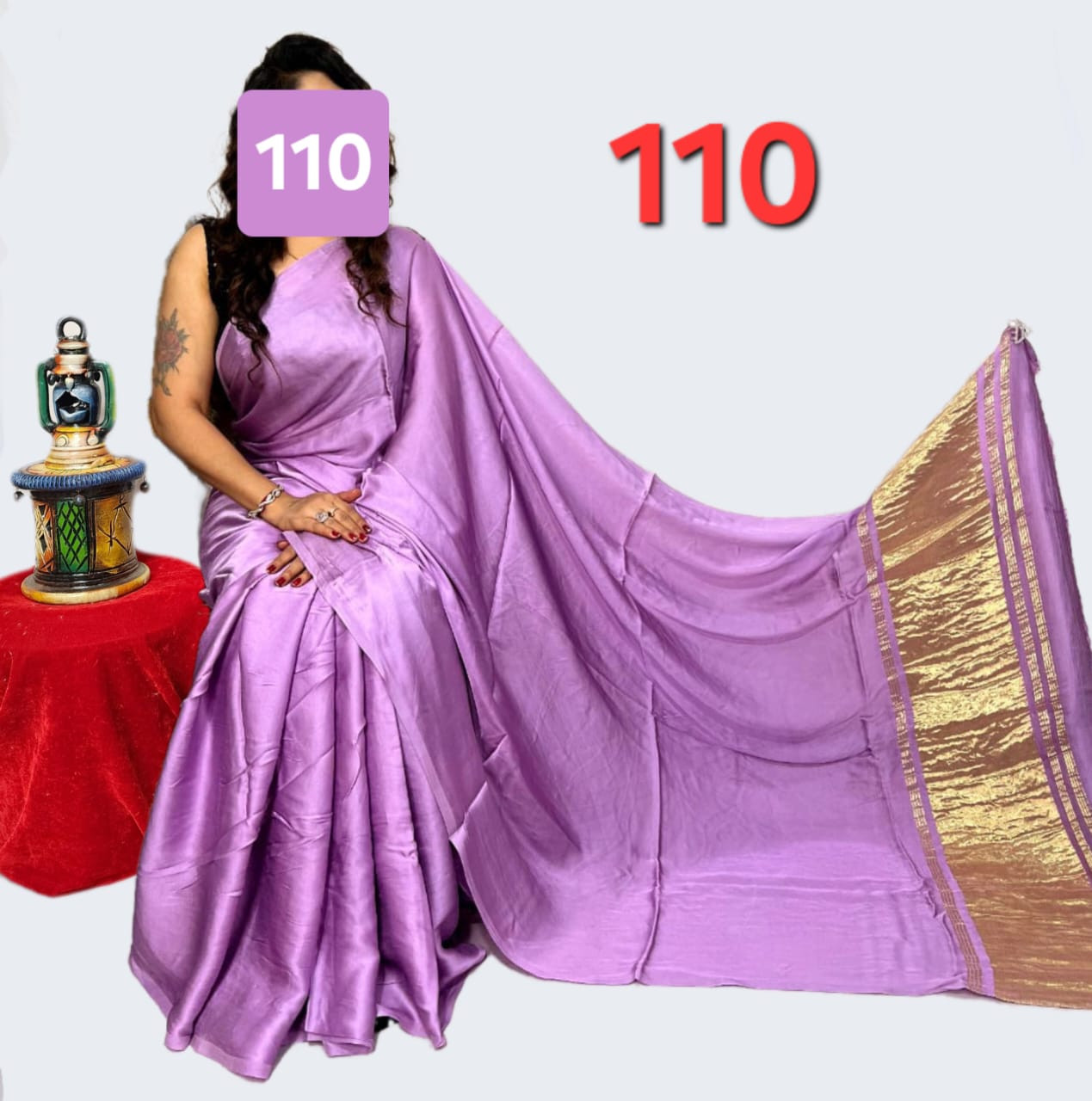 Lavender Modal Silk Saree with a Traditional Gold Zari Border.