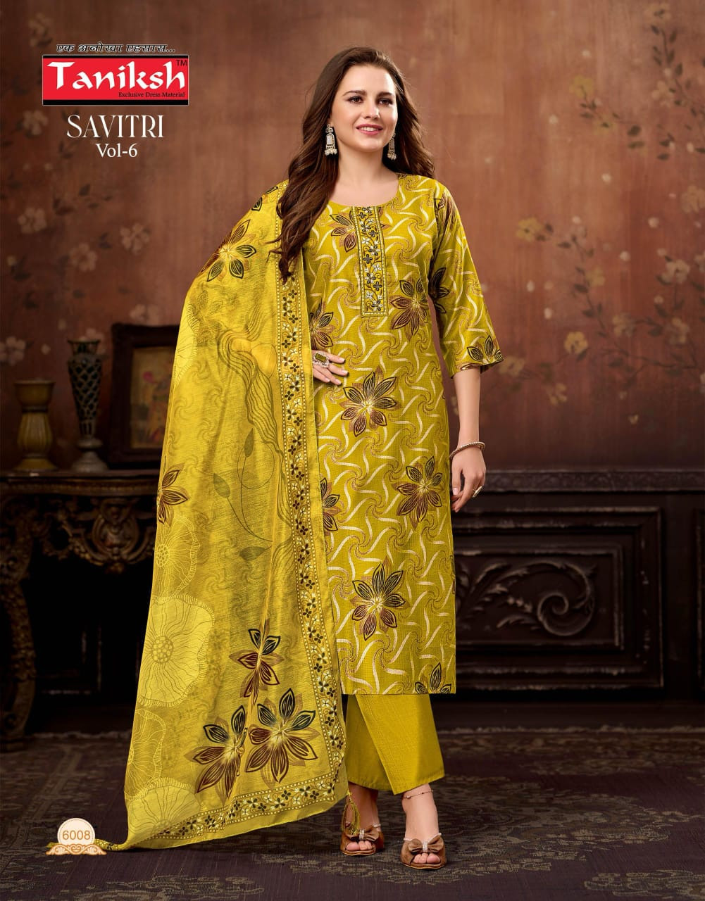 Taniksh Savitri suit in yellow with floral print.