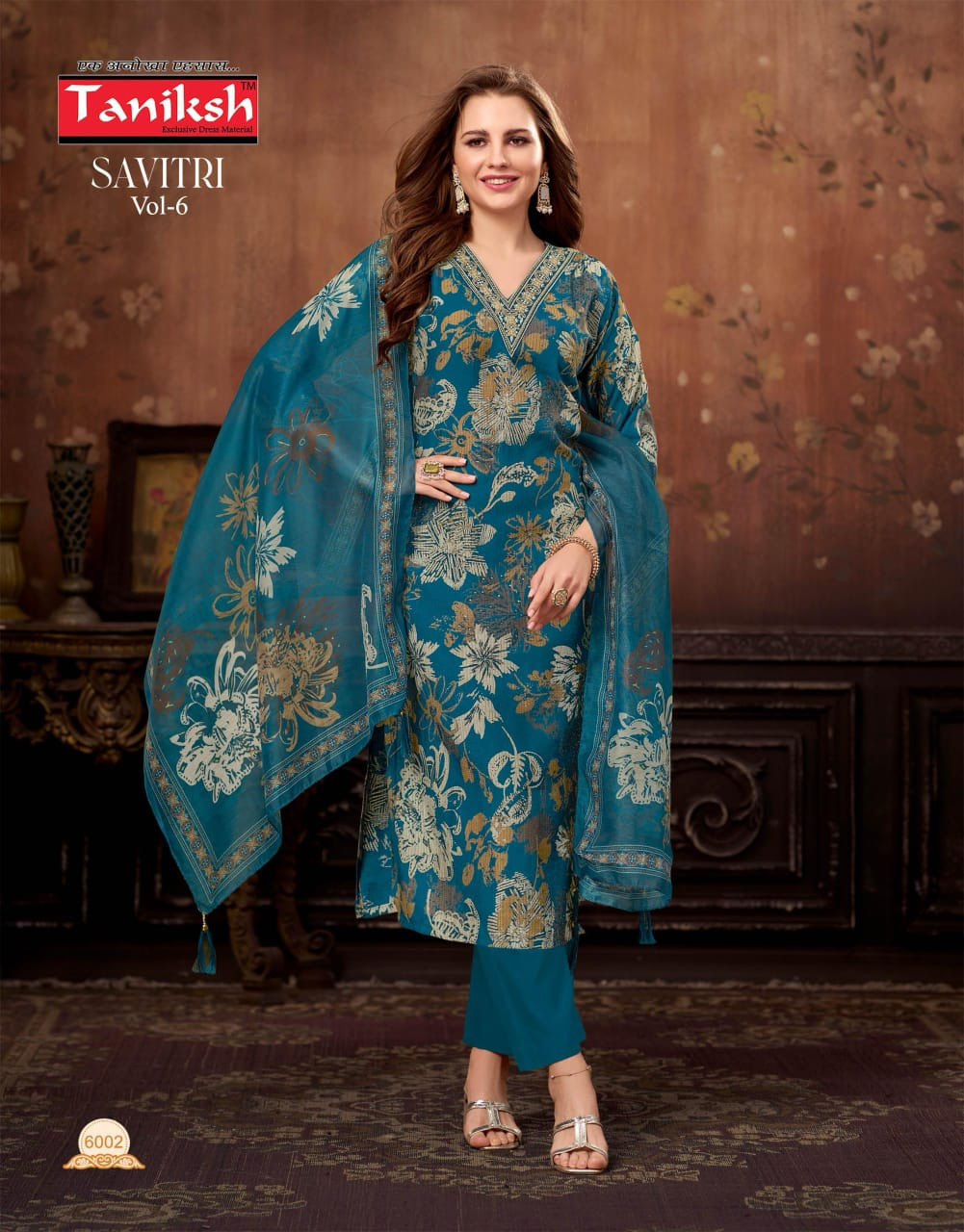 Taniksh Savitri suit in teal blue with floral print.