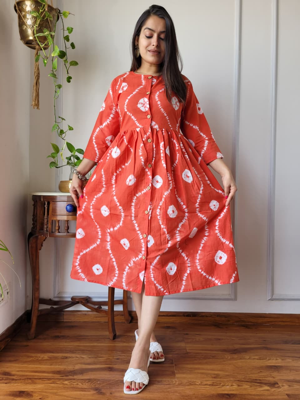 Orange, Yellow, and White Tie-Dye Cotton One Piece Dress with a front button placket.