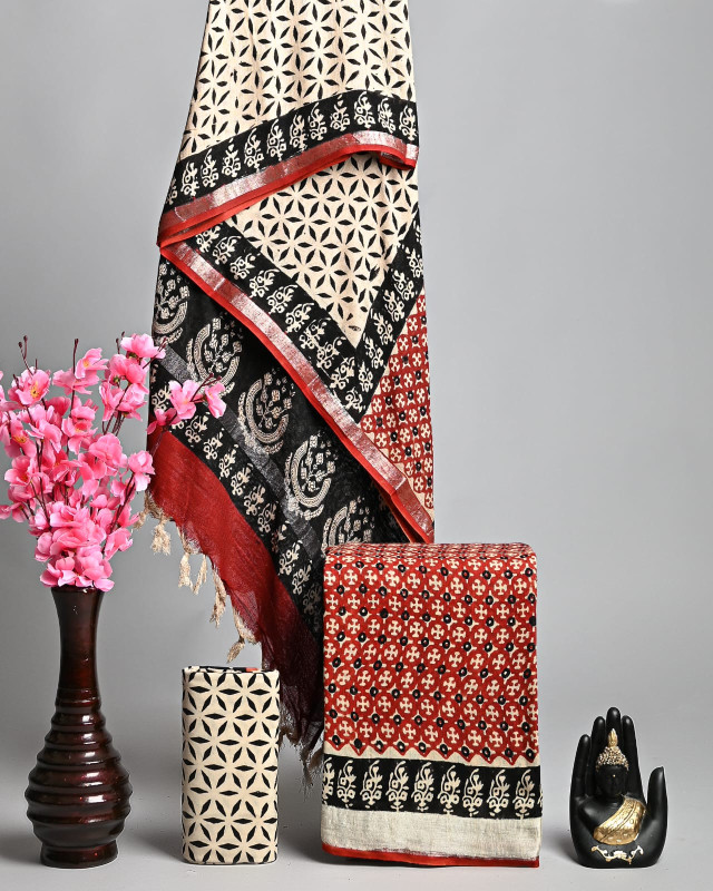 Cream, black, and red colored hand block printed linen unstitched suit with geometric and floral designs.