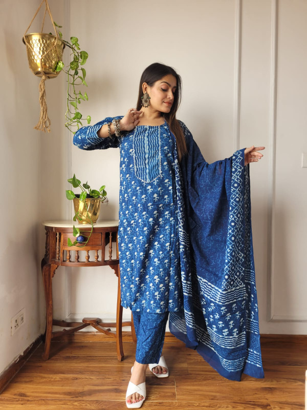 indigo blue and white hand block printed cotton kurta, pants, and dupatta suit set.