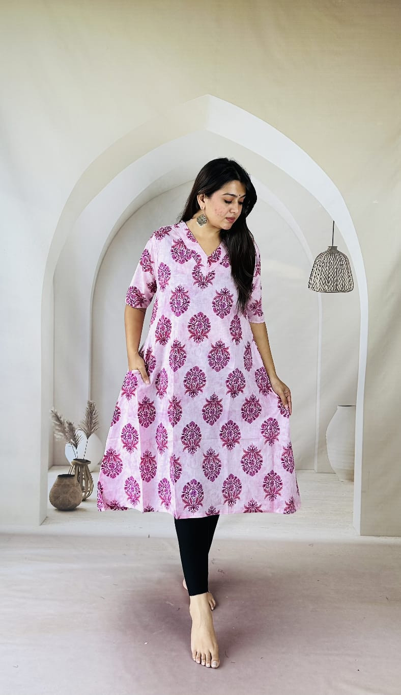 Pink and white printed cotton A-line kurti