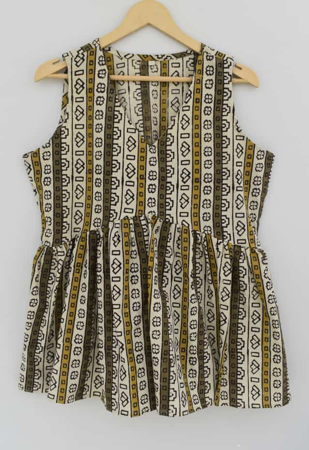 a brown, olive green, and off-white hand-block printed, geometric stripe pattern cotton sleeveless peplum top