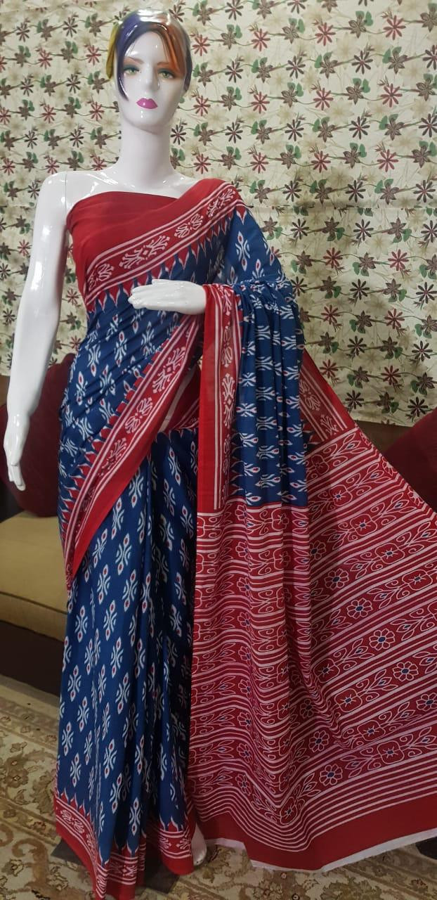 Midnight Blue and Crimson Red Ikat Cotton Saree with Traditional Floral and Geometric Borders.