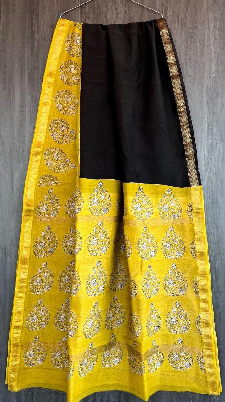 Black and yellow hand block printed Maheshwari silk cotton blend saree with zari border