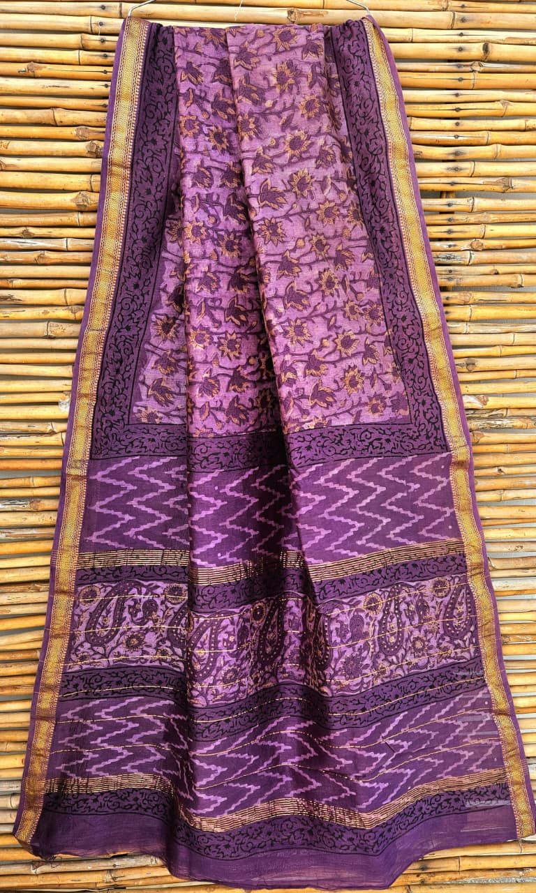purple hand-block printed Maheshwari silk/cotton blend saree with zigzag and traditional floral and paisley motifs and a golden zari border